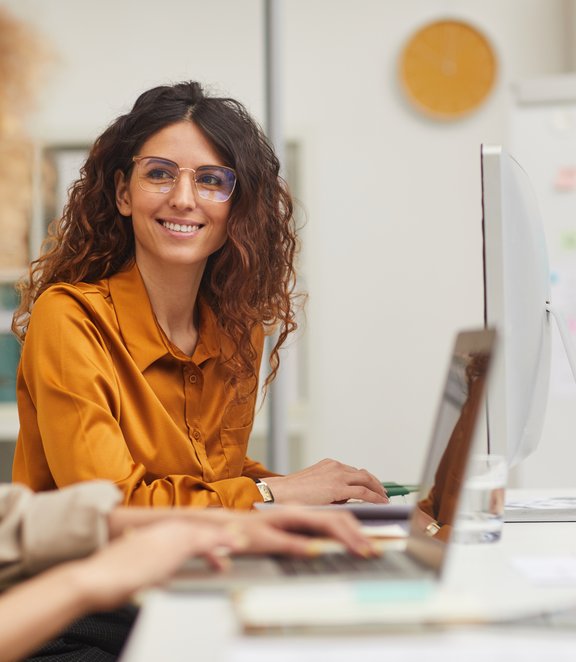 friendly woman at desk