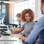 woman at office with laptop